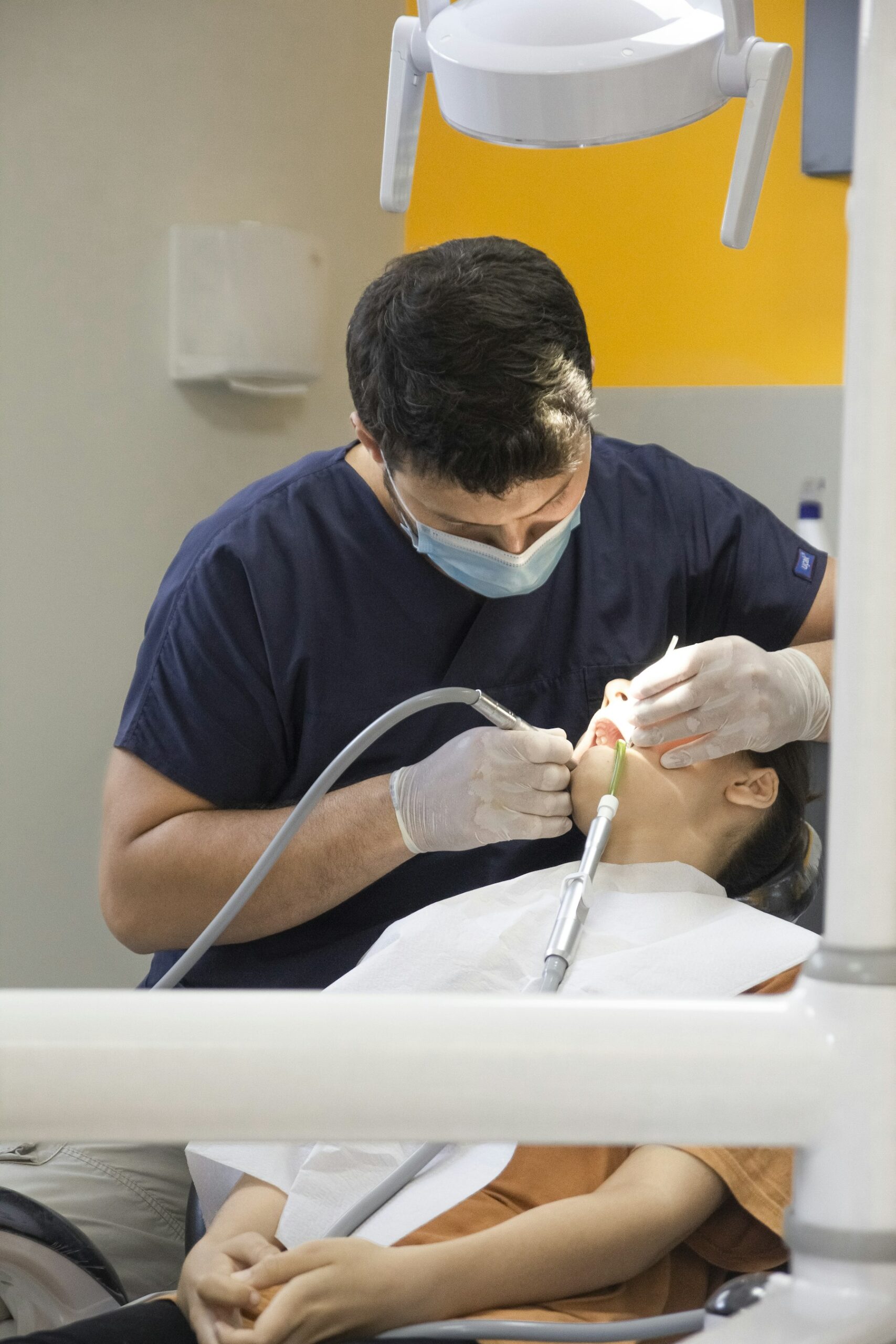 Dentist at work with a patient